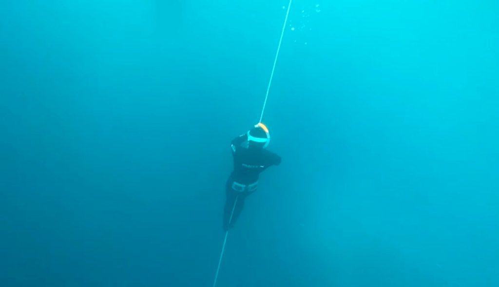 A person learning to freedive in the Cap de Creus