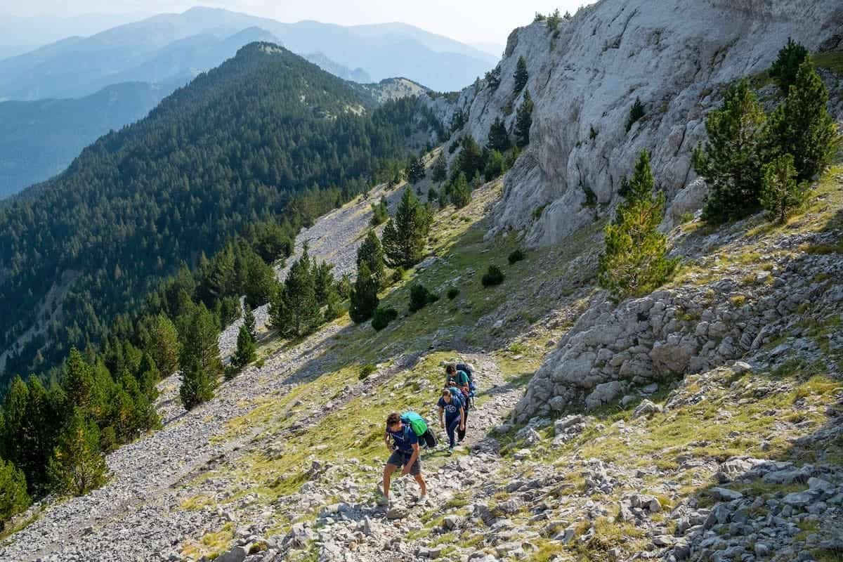People hiking the Cavalls del Vent in the Pyrenees